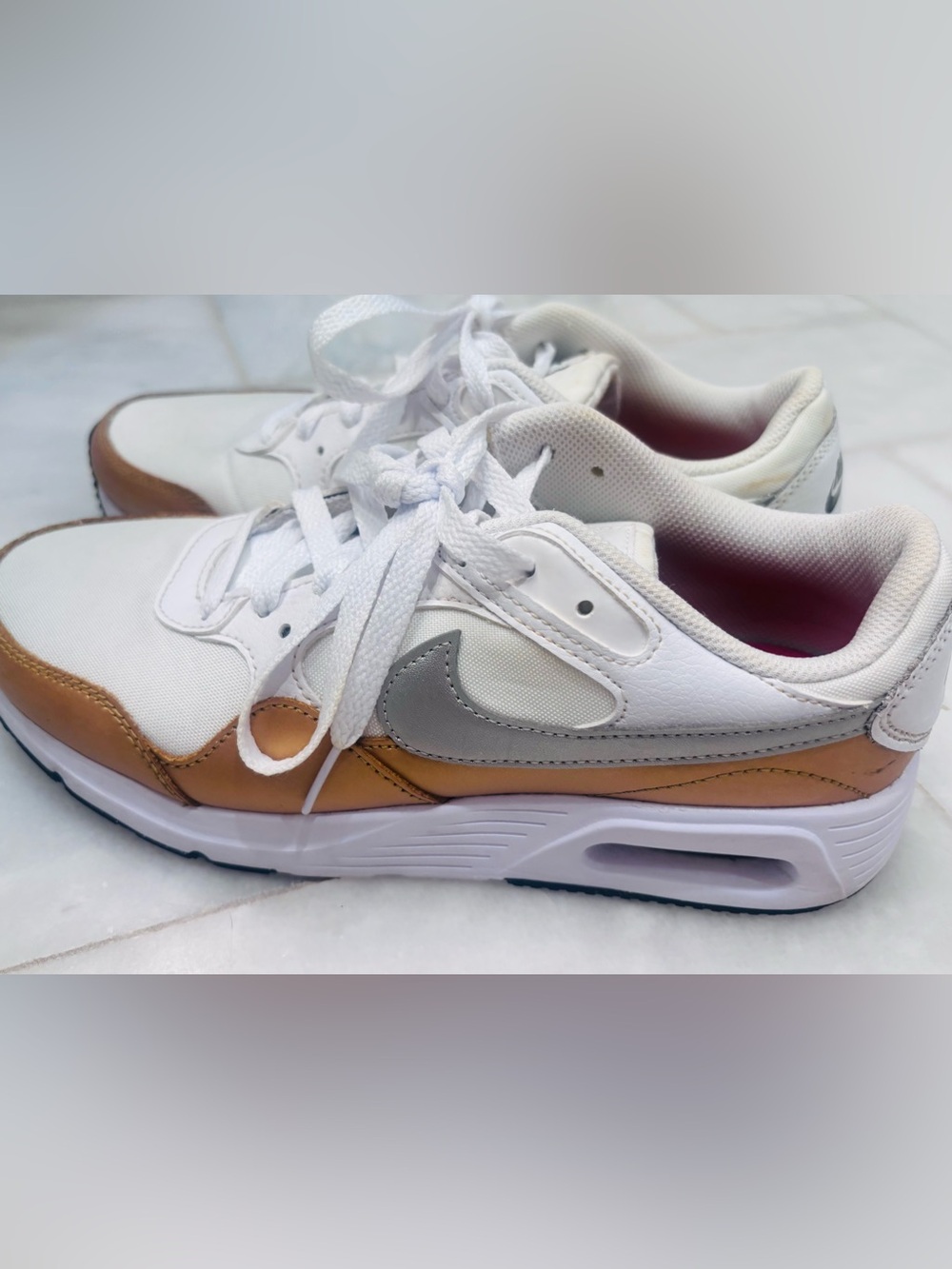 Nike Women’s White & Metallic Bronze and Silver Sneakers. Size 9.5 exc condition